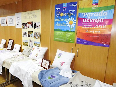 Orhideje in vezenine